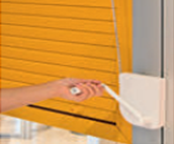 Шнуровой привод, редукторный рольставни